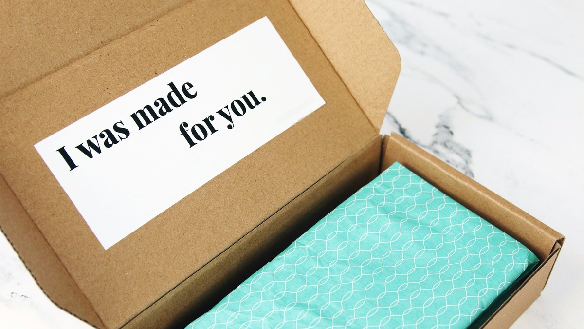 Open subscription box with a card reading “I was made for you.”